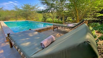 Outdoor pool, pool umbrellas, sun loungers