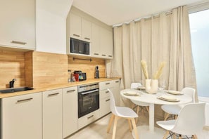 Apartment | Private kitchen | Fridge, microwave, oven, stovetop