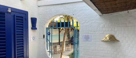 Deluxe Double Room, Patio, Pool View | Terrace/patio