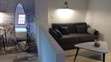 Habitación cuádruple, vistas al jardín | Cortinas opacas y sistema de insonorización