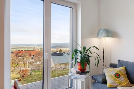 TV. Apartment 'Am Rothen Hang' with Mountain View, Private Terrace and Wi-Fi