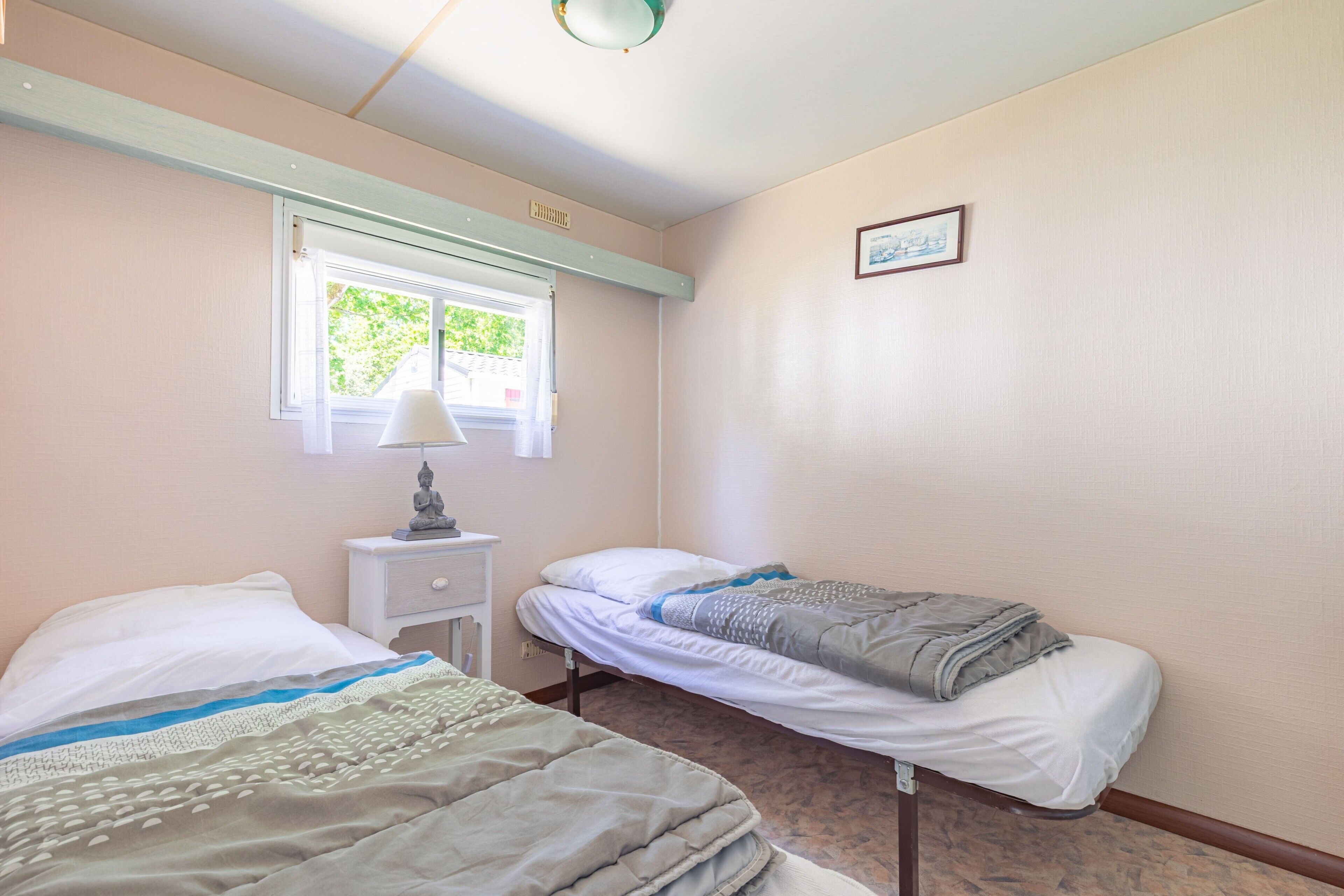 2 slaapkamers, een strijkplank/strijkijzer