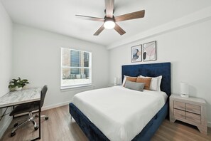 1 bedroom, desk, iron/ironing board, travel cot