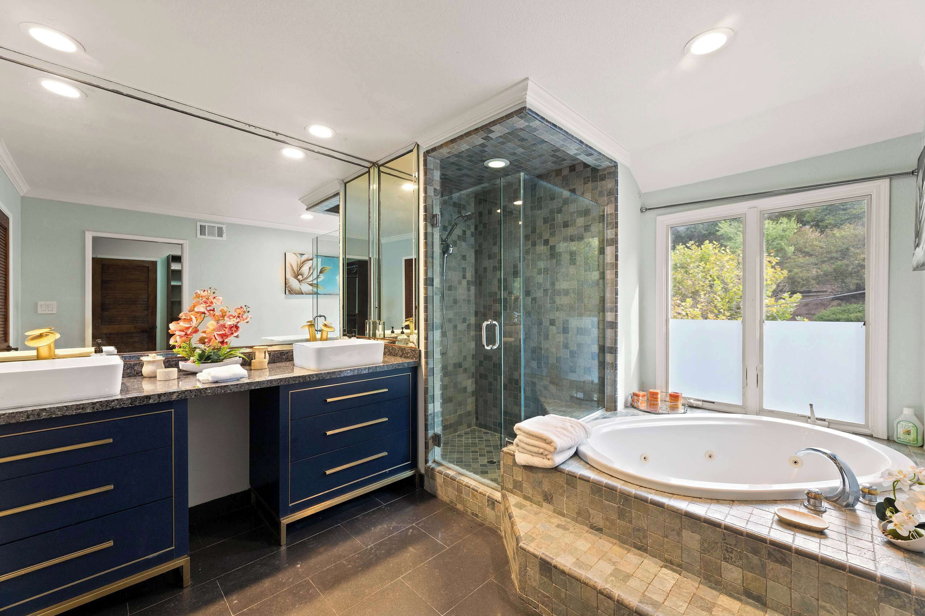 Shower, hair dryer, towels, shampoo