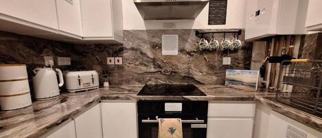 Fridge, microwave, oven, cookware/dishes/utensils