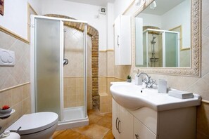 Hair dryer, bidet, towels, soap