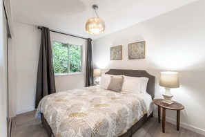 2 bedrooms, desk, iron/ironing board, travel crib