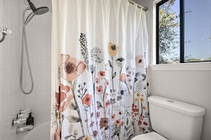 Shower, hair dryer, towels