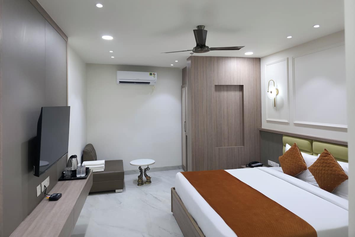 Quarto executivo | Roupas de cama premium, Wi-Fi de cortesia, roupa de cama