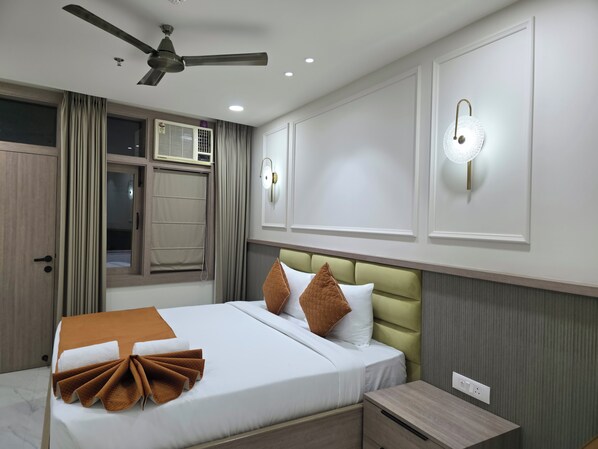 Quarto superior | Roupas de cama premium, Wi-Fi de cortesia, roupa de cama