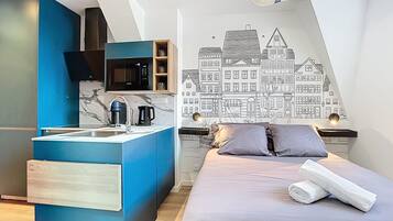 1 slaapkamer, een strijkplank/strijkijzer, wifi, beddengoed