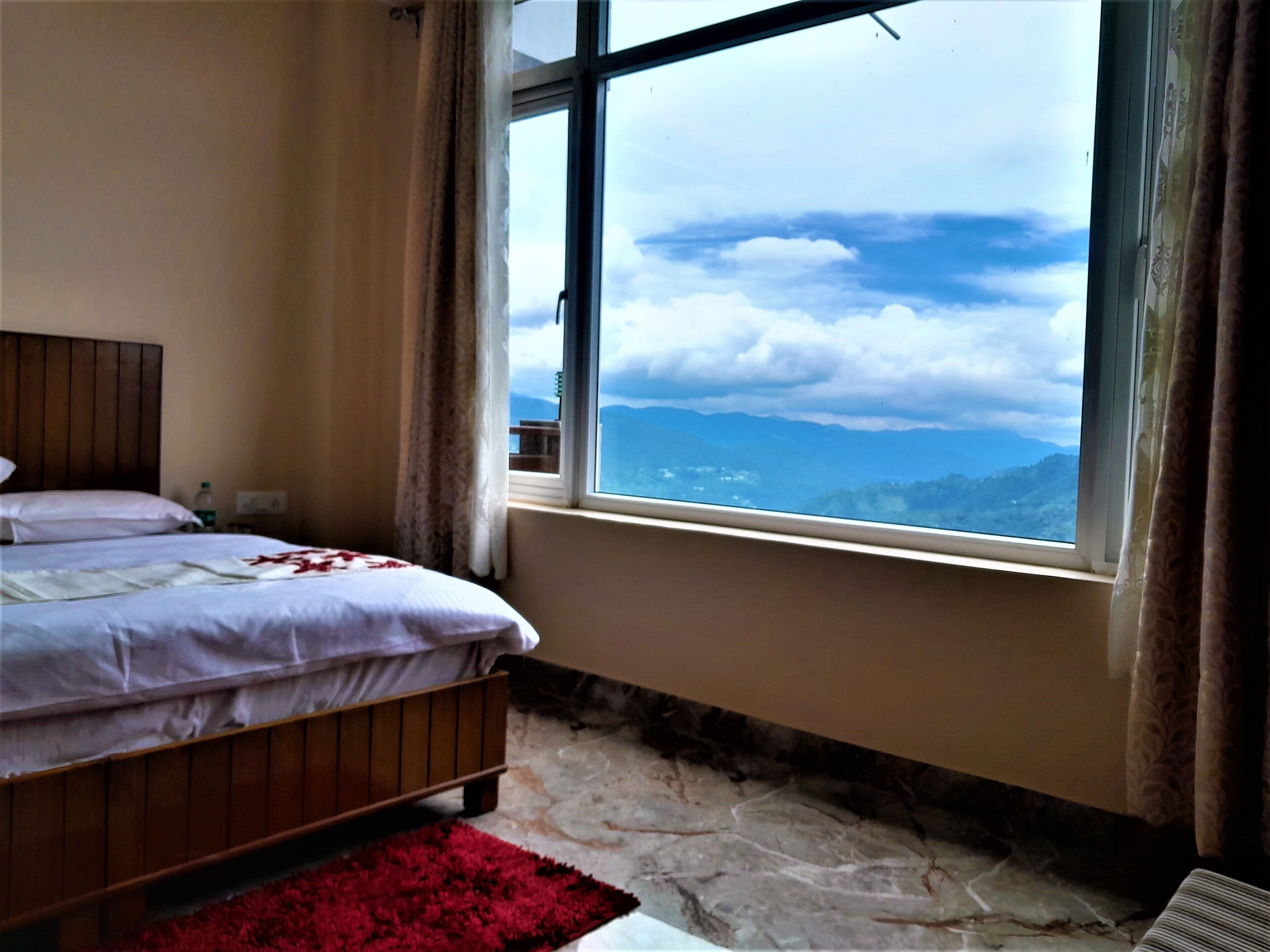 Deluxe Room, Mountain View | In-room safe, blackout drapes, iron/ironing board, free WiFi