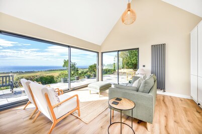 3-bedroom, fully furnished and newly refurbished house, with panoramic views over the Moray Firth.