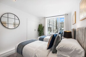 2 habitaciones, tabla de planchar con plancha y wifi gratis 