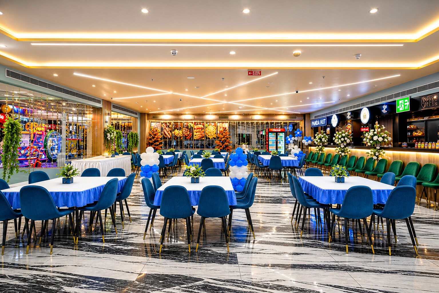 A spacious indoor dining area with multiple tables and chairs, a polished marble floor, and a variety of food and beverage outlets in the background.
