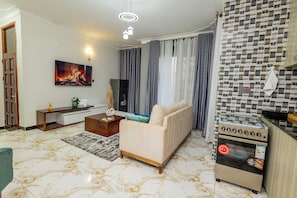 Comfort Apartment, City View | Living area