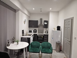 Apartamento, 1 quarto, acessível, sacada | Sala de estar