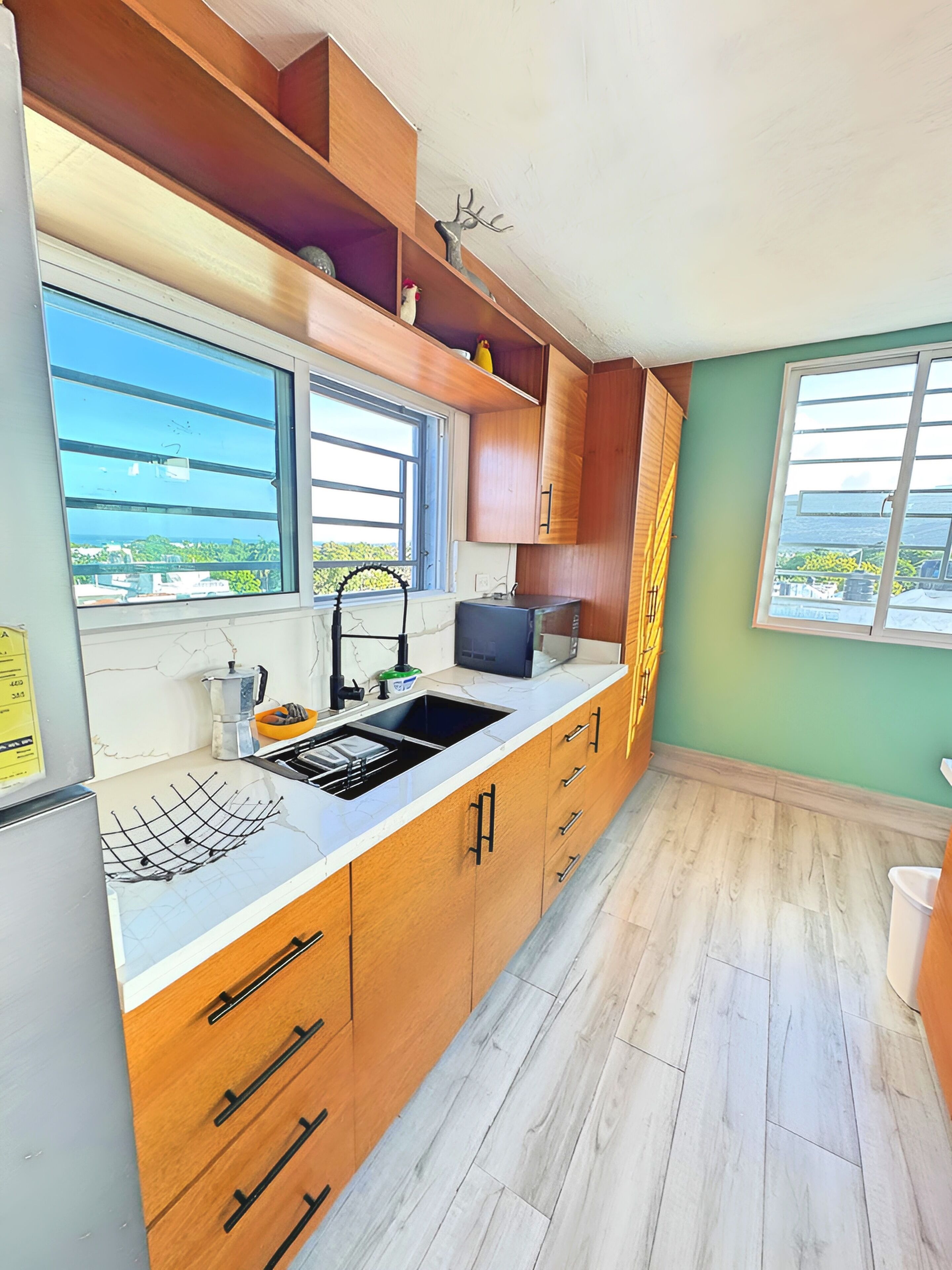 Fridge, microwave, stovetop, coffee/tea maker