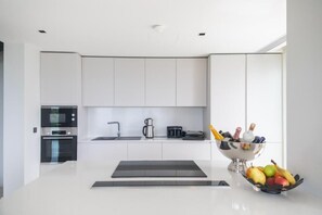 Deluxe Villa, Balcony | Private kitchen | Coffee/tea maker, electric kettle