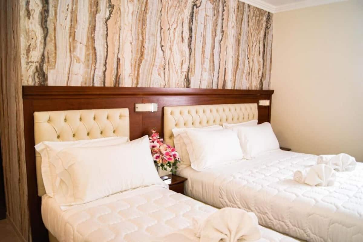 Standard Suite | In-room safe, desk, soundproofing, iron/ironing board
