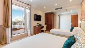 Suite, Balcony, City View | In-room safe, desk, laptop workspace, soundproofing
