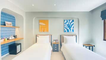 Deluxe Twin Room, Multiple Beds, Balcony, City View | Pillow-top beds, minibar, in-room safe, individually decorated