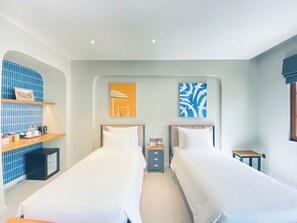 Deluxe Twin Room, Multiple Beds, Balcony, City View | Pillow-top beds, minibar, in-room safe, individually decorated - Tramonto Phu Quoc Hotel (Phu Quoc)