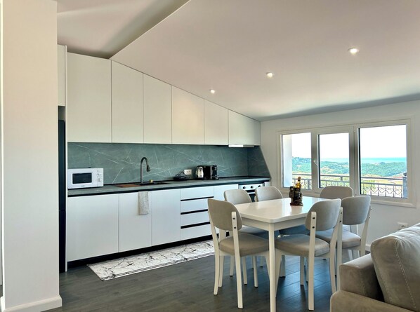 Apartment, 1 Queen Bed with Sofa bed, Balcony, Hill View | Private kitchen | Full-sized fridge, microwave, oven, stovetop