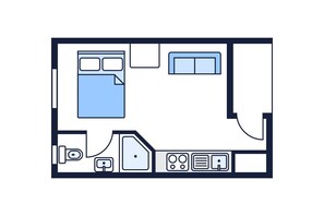 A floor plan of a hotel room with a bed, a desk, a bathroom, and a kitchenette. - Kalganyi Holiday Park (Mount Gambier)