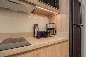 Fridge, microwave, stovetop, coffee/tea maker