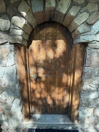 Exterior detail. Starlight Cottage: Unwind in this cozy historic adobe