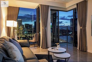 Royal Apartment, 3 Bedrooms, River View, Courtyard Area | Living area | 24-inch TV with cable channels, books, music library