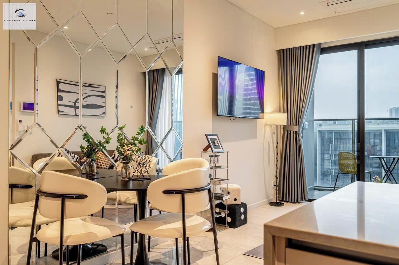 デラックス アパートメント 2 ベッドルーム 禁煙 シティビュー | リビング エリア | 24 インチのテレビ (ケーブル放送視聴可)、書庫、ミュージックライブラリ