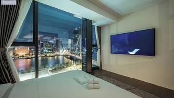 Appartamento Deluxe, 2 camere da letto, patio | Minibar, Wi-Fi gratuito, lenzuola