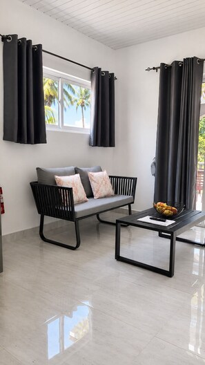 Chambre Double Deluxe | Coin séjour