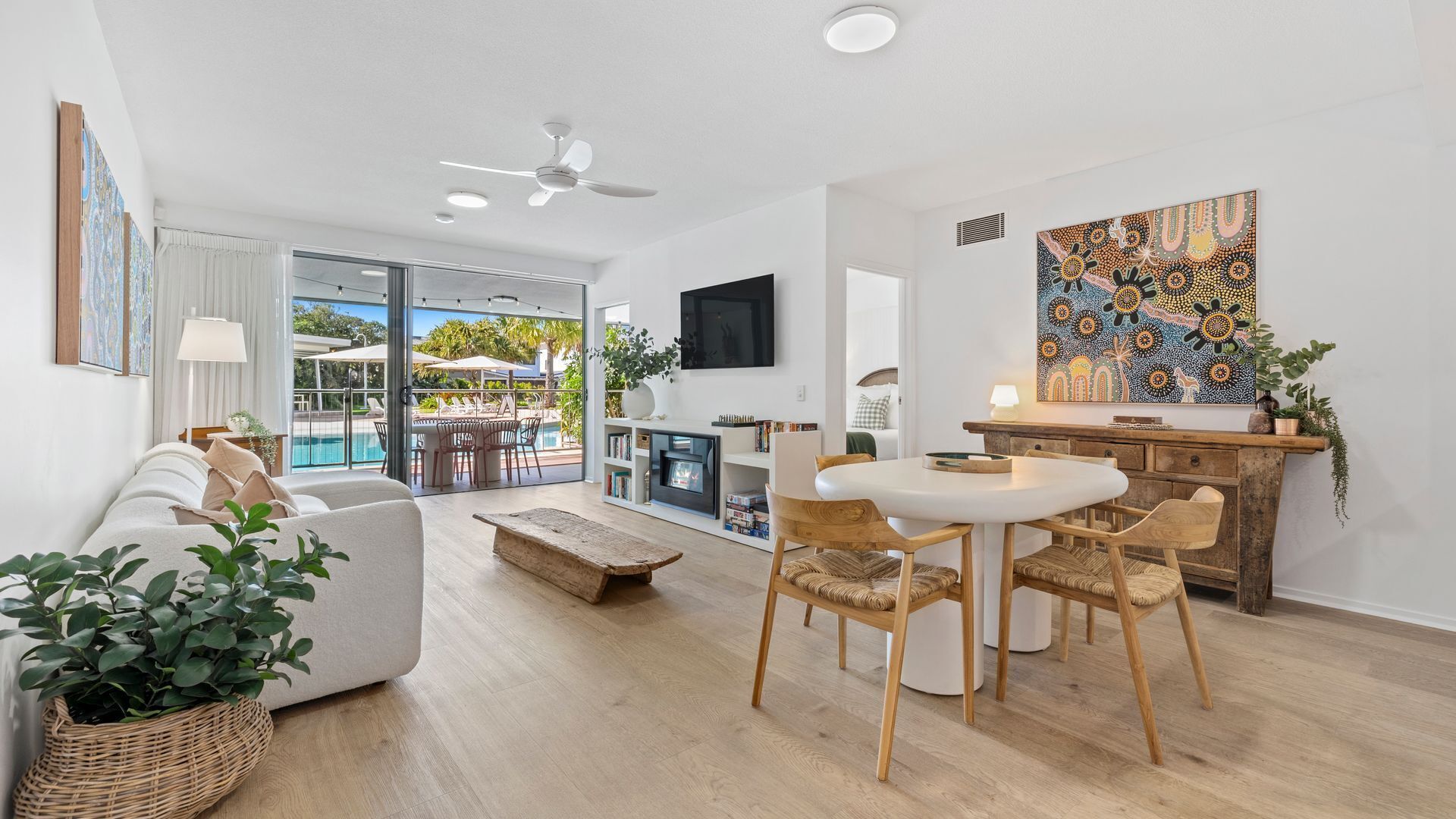 TV, fireplace, books