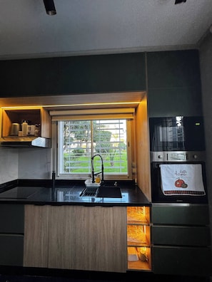 Apartamento, 2 quartos, para fumantes, piscina particular | Cozinha privada