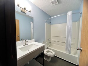Combined shower/bathtub, hair dryer, towels, soap