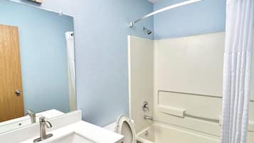 Combined shower/bathtub, hair dryer, towels, soap