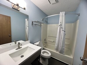 Combined shower/bathtub, hair dryer, towels, soap