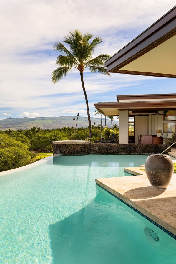 A heated pool - Champion Ridge 7 by Gather: Oceanview Estate w/ Pool & Hot Tub (Kamuela)