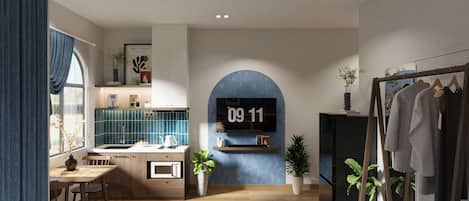 Studio Deluxe, 1 très grand lit, vue partielle sur l'océan | Literie hypoallergénique, minibar, bureau