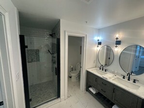 Shower, hair dryer, towels, soap