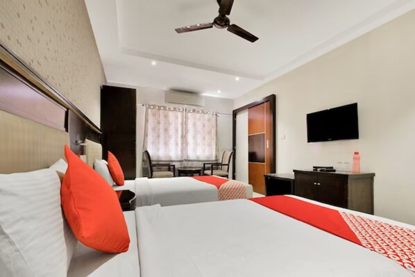 In-room safe, laptop workspace, blackout drapes, soundproofing