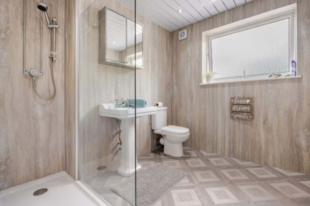 Shower, hair dryer, towels, shampoo