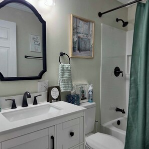 Hair dryer, towels, soap, toilet paper