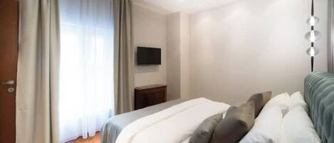 1 slaapkamer, een strijkplank/strijkijzer, wifi, beddengoed