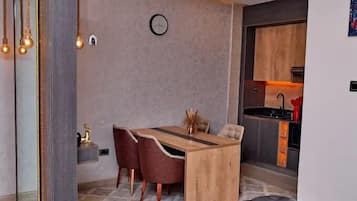 Economy Apartment, Balcony, City View | Private kitchenette | Fridge, microwave, oven, stovetop