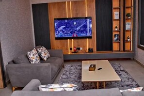 Economy Apartment, Balcony, City View | Living area