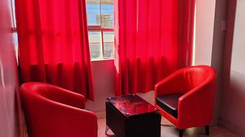 Family Twin Room, 2 Queen Beds, City View | Premium bedding, memory-foam beds, laptop workspace, iron/ironing board